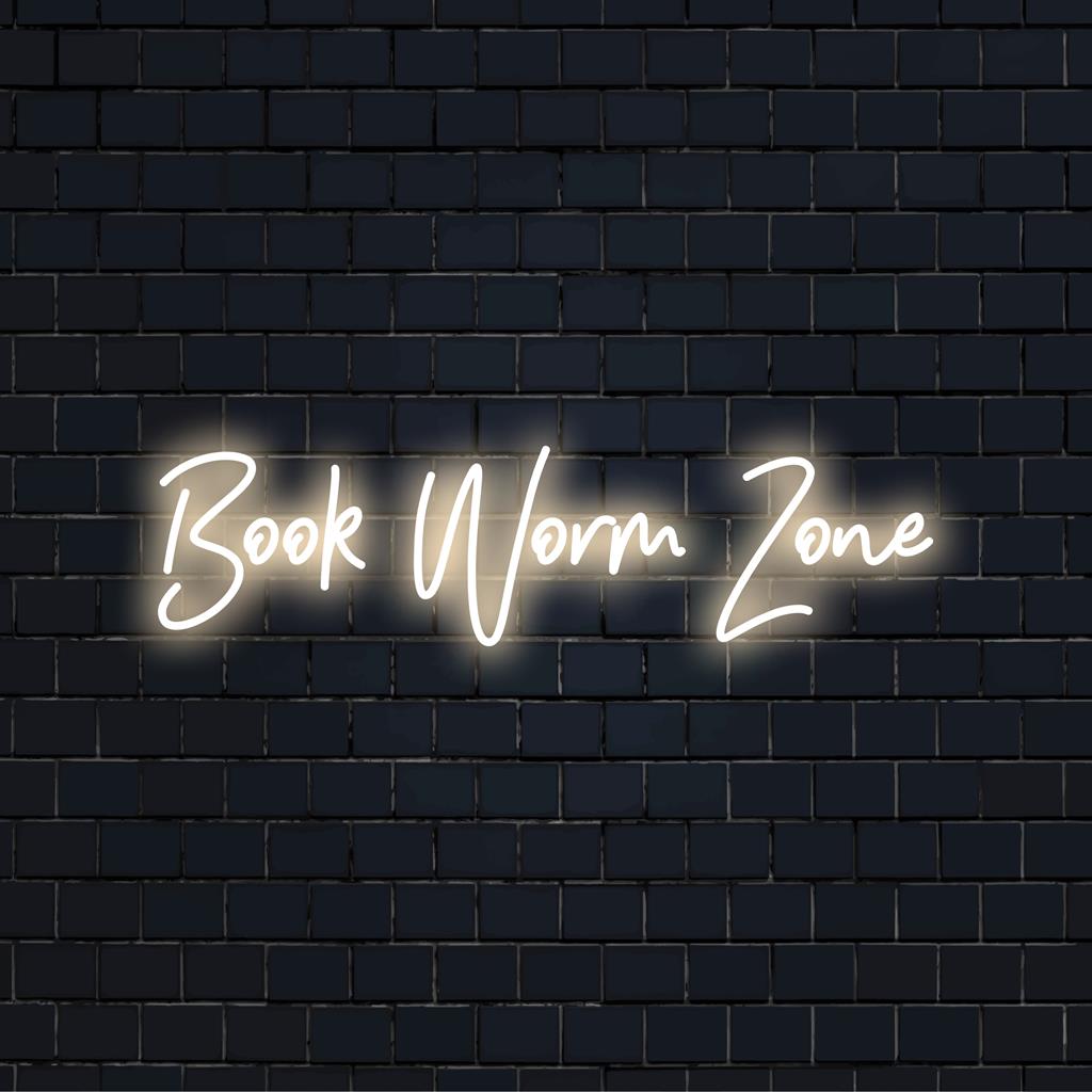 Aangepast LED-neonbord met de tekst Book Worm Zone in speelse typografie, perfect voor een gezellige leeshoek.
