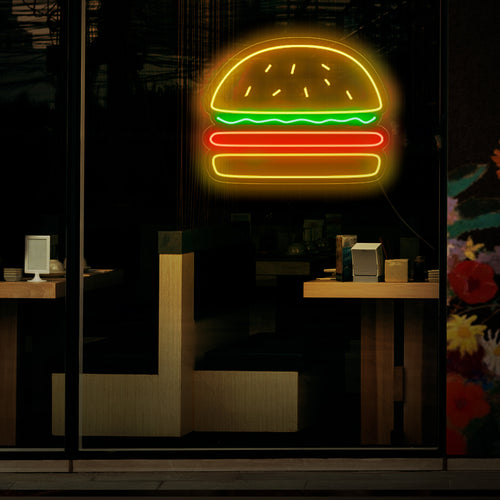 "Burger Neon Sign" - Een overheerlijk neonlicht met het iconische symbool van een hamburger. Het zorgt voor een sfeer van heerlijk eten en liefde voor klassieke fastfoodfavorieten in uw hamburgertent of restaurant.