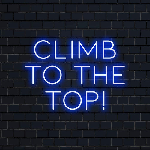 Neonreclame met de tekst 'Climb To The Top!'. Perfect voor een moderne inrichting, inspirerende ambiance en persoonlijke woonaccenten.