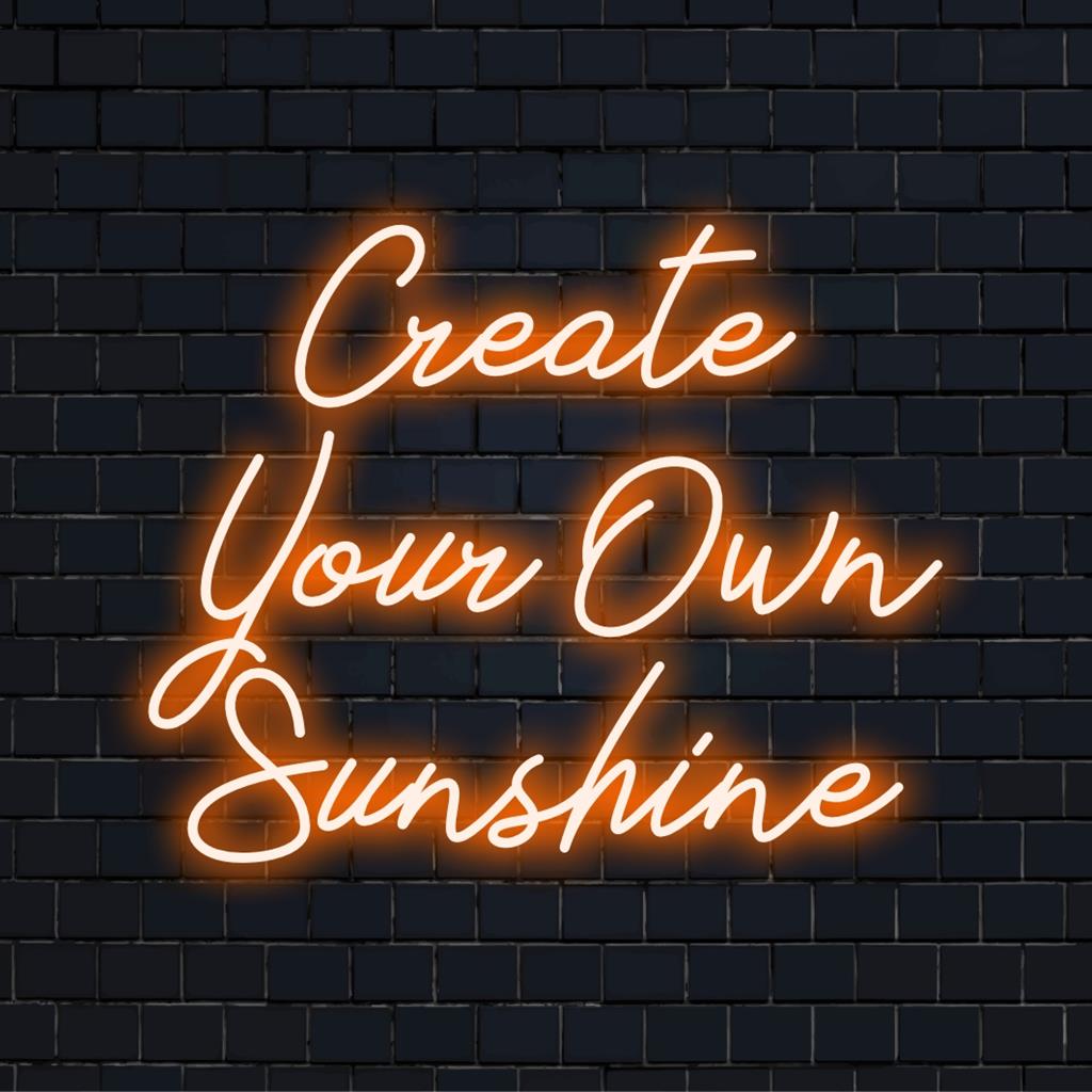Kleurrijk LED-neonbord met de tekst 'Create Your Own Sunshine'; perfecte neonmuurkunst en op maat gemaakte lichtdecoratie.