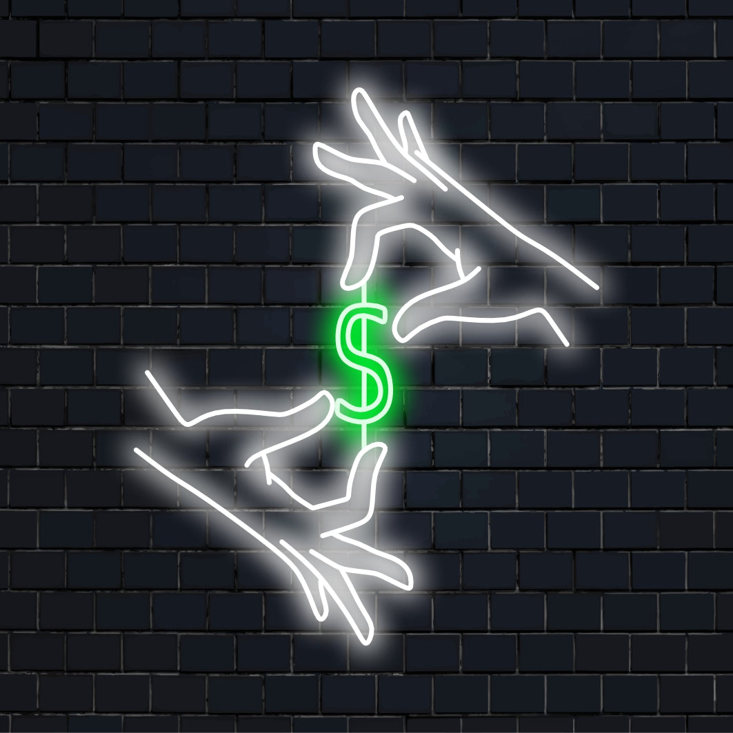 "Dollar Between Hands Neon Sign" licht op met een opvallende gloed, wat symbool staat voor financieel succes en voorspoed. Het is daarom perfect voor bedrijven en ruimtes die financiële successen vieren.