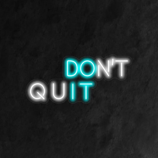 Vibrant neon sign with motivational message, Don't Quit Do It, perfect as eye-catching personalized neon wall art or decor.