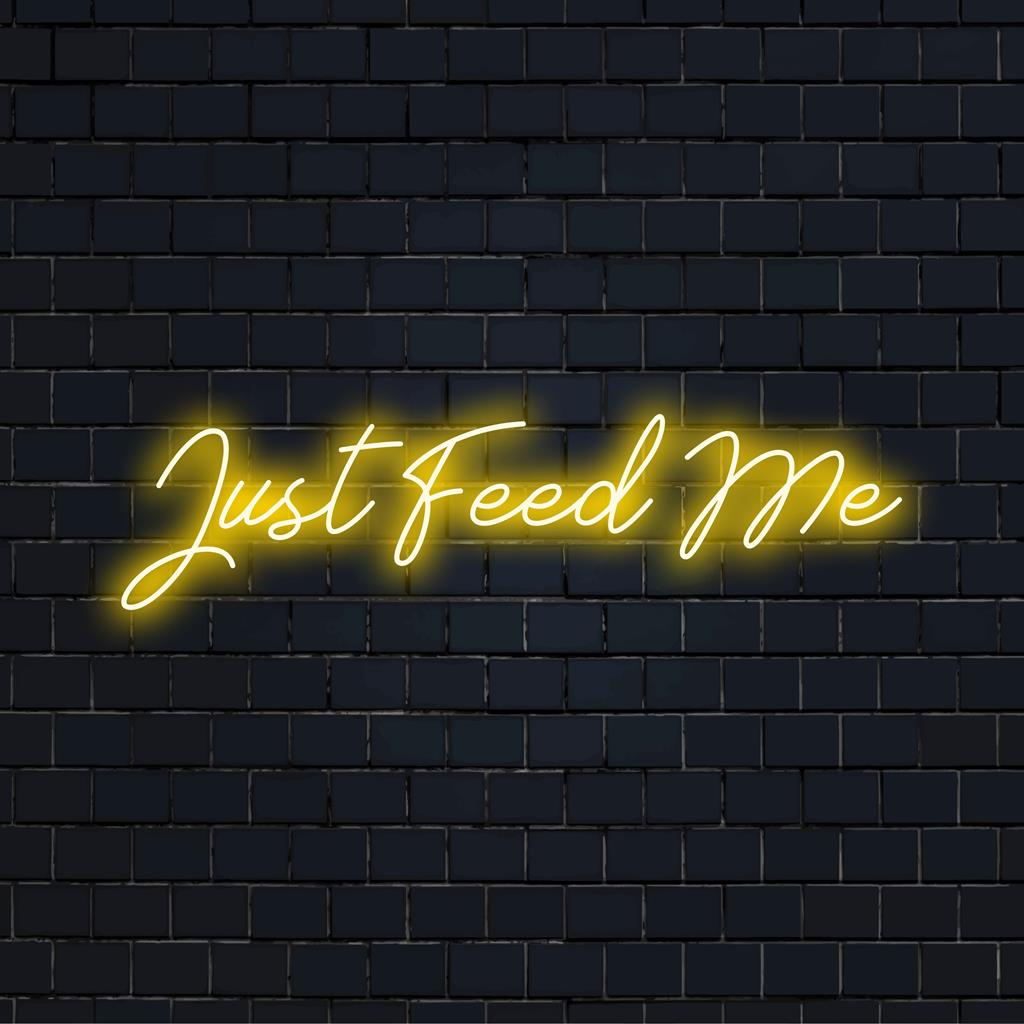 Levendig LED-neonkunstwerk met de tekst 'Just Feed Me', perfect voor het verlichten van elke ruimte met een opvallende, op maat gemaakte neonstijl.