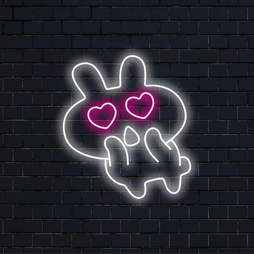 "Lovestruck Bunny Neon Sign" is een schattige en charmante toevoeging voor ruimtes vol fantasie en liefde. Verlicht met betovering geïnspireerd op konijnen!