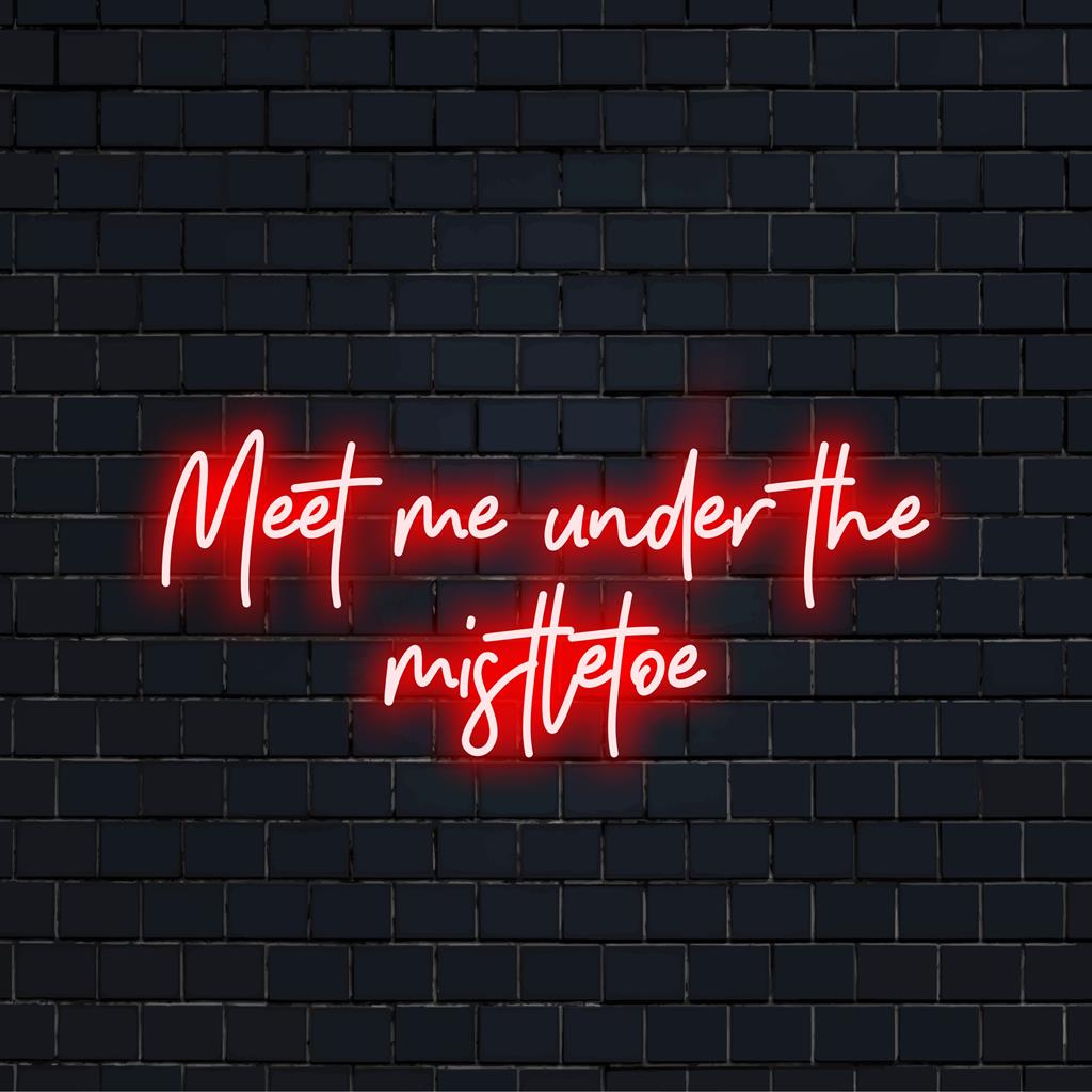 Custom LED sign reading Meet Me Under the Mistletoe; festive neon decor, perfect for holiday gatherings and seasonal flair.