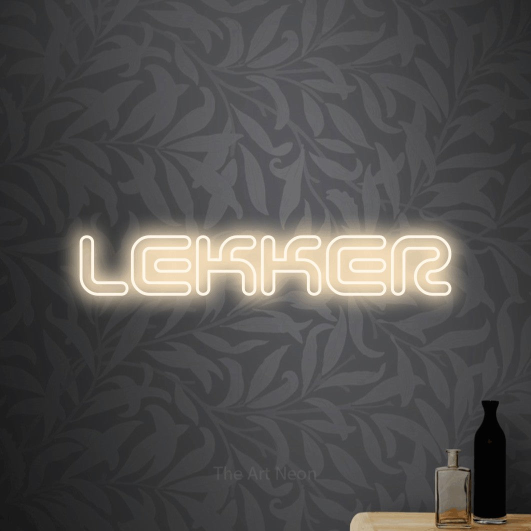LED neon sign reading “LEKKER”, arranged in a single line.