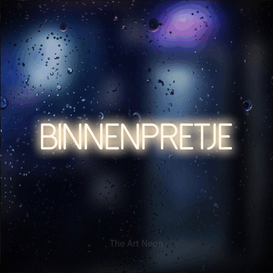 LED neon sign reading “BINNENPRETJE”, arranged in a single line.