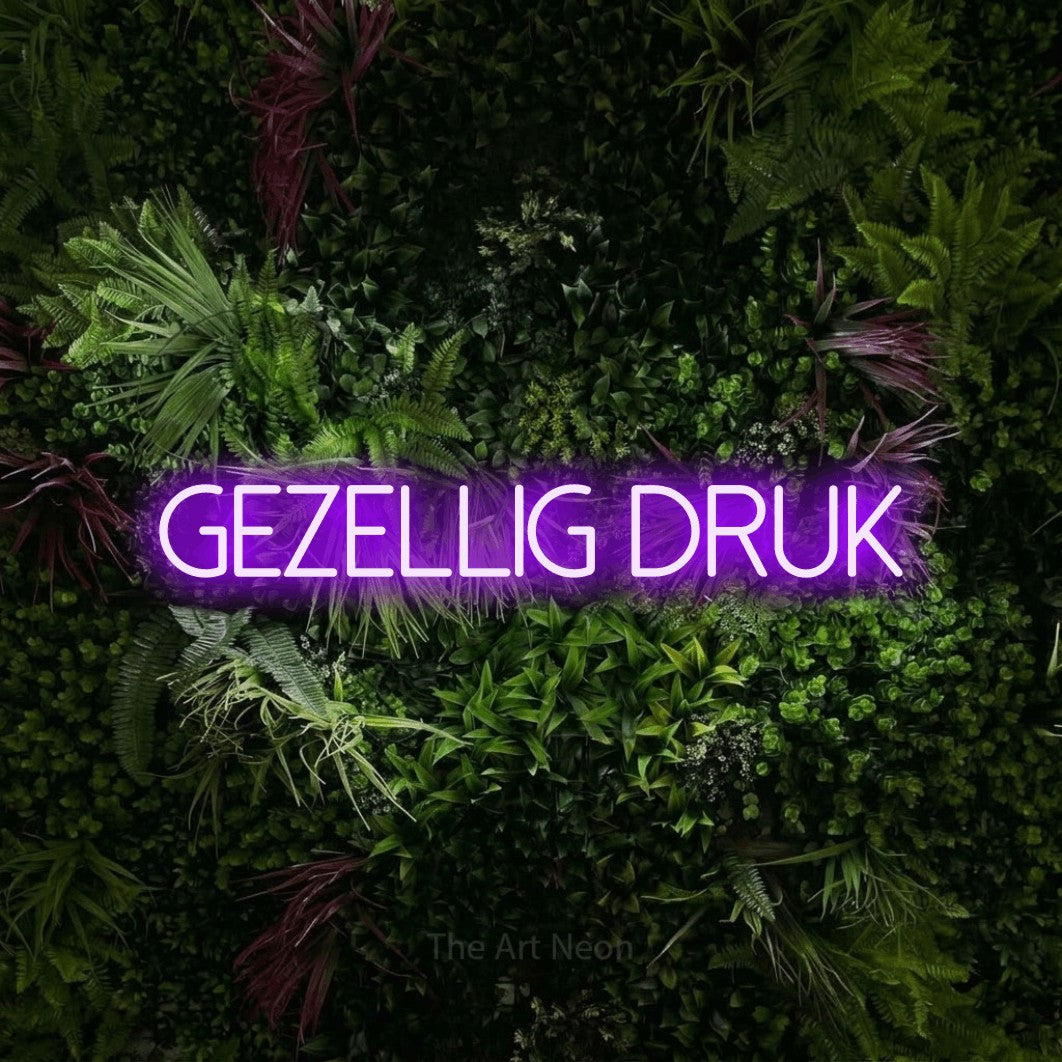 LED neon sign reading “Gezellig Druk”, arranged in a single line.