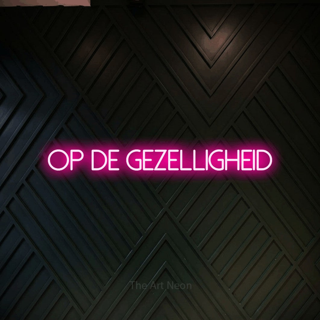 LED neon sign reading “OP DE GEZELLIGHEID”, arranged in a single line.