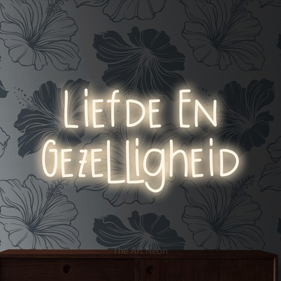 LED neon sign reading “Liefde En Gezelligheid”, arranged in 2 lines.