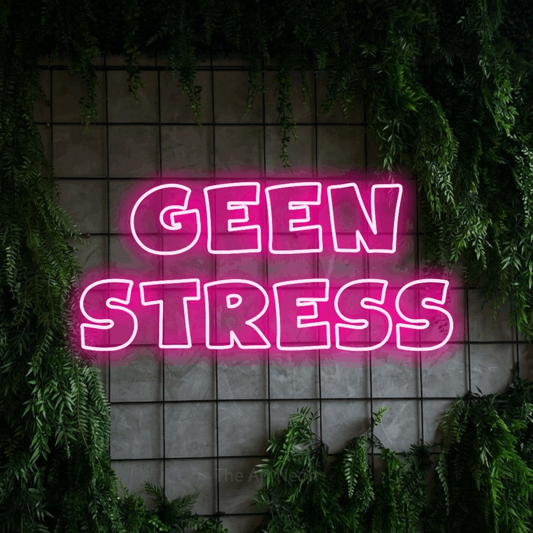 LED neon sign reading “GEEN stress”, arranged in 2 lines.