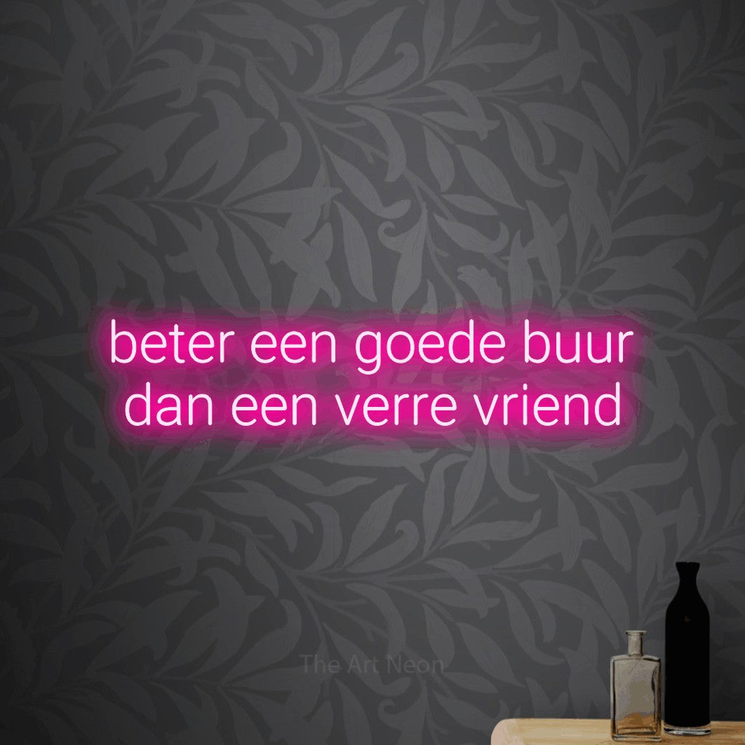 LED neon sign reading “beter een goede buur dan een verre vriend”, arranged in 2 lines.