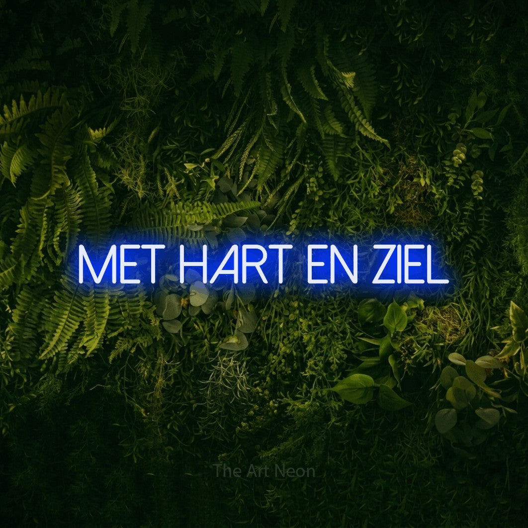 LED neon sign reading “Met Hart En Ziel”, arranged in a single line.