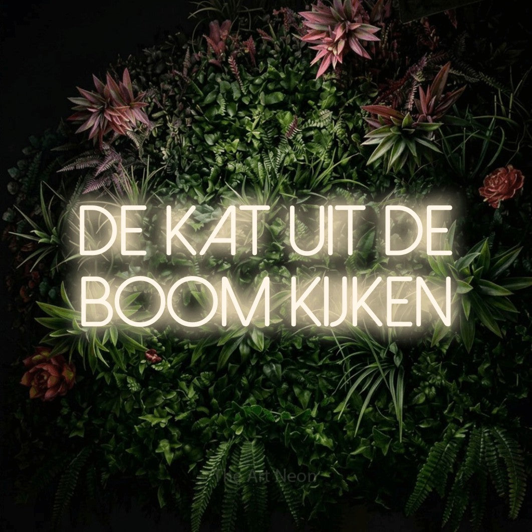 LED neon sign reading “DE KAT UIT DE BOOM KIJKEN”, arranged in 2 lines.