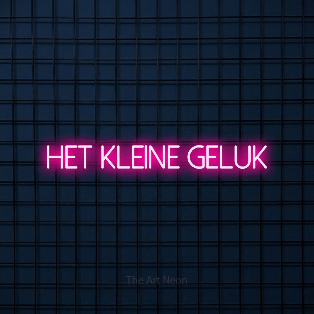LED neon sign reading “HET kleine geluk”, arranged in a single line.