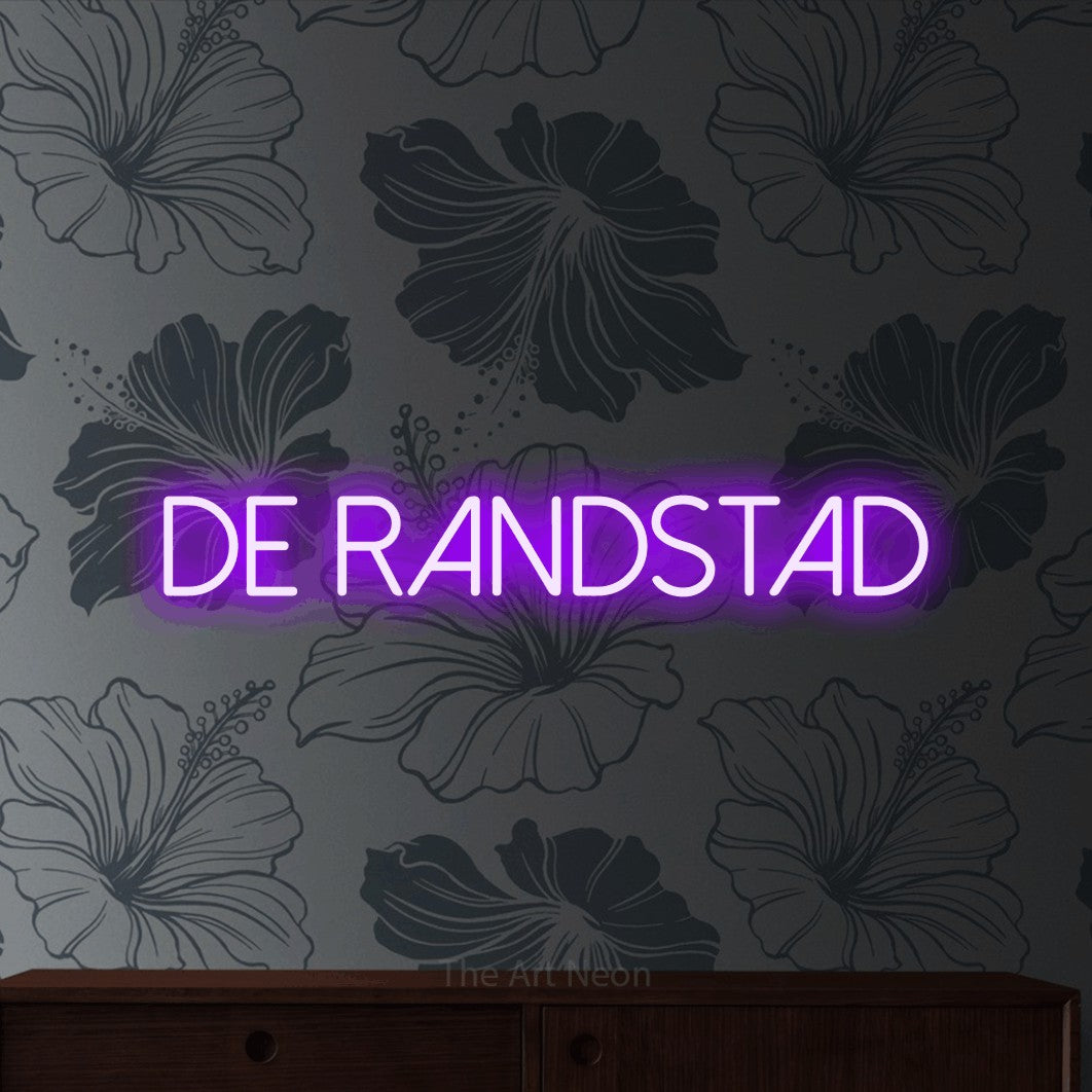 LED neon sign reading “de randstad”, arranged in a single line.
