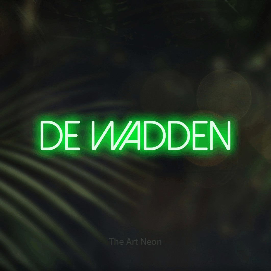LED neon sign reading “De Wadden”, arranged in a single line.