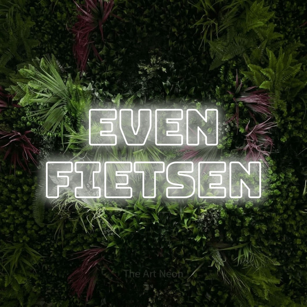 LED neon sign reading “even fietsen”, arranged in 2 lines.