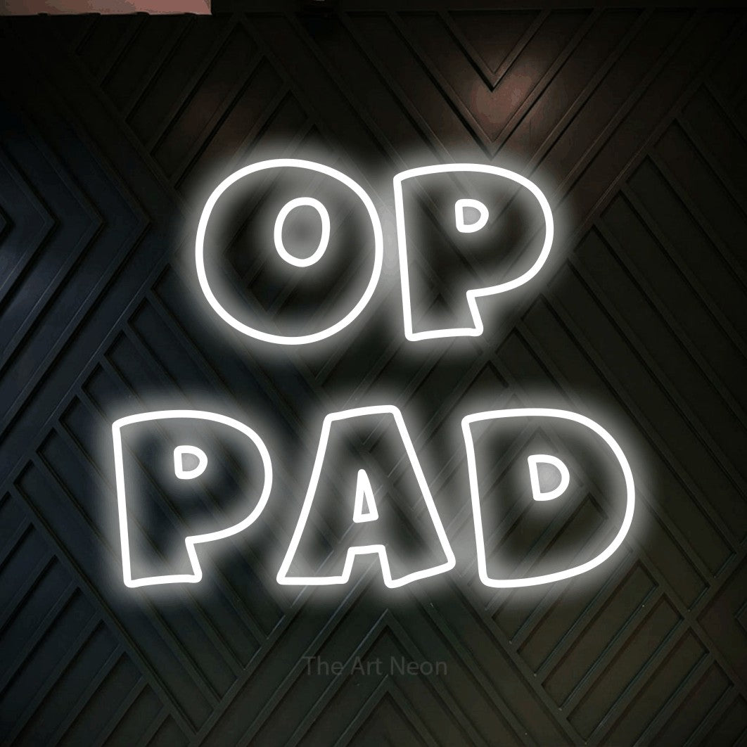 LED neon sign reading “Op Pad”, arranged in 2 lines.
