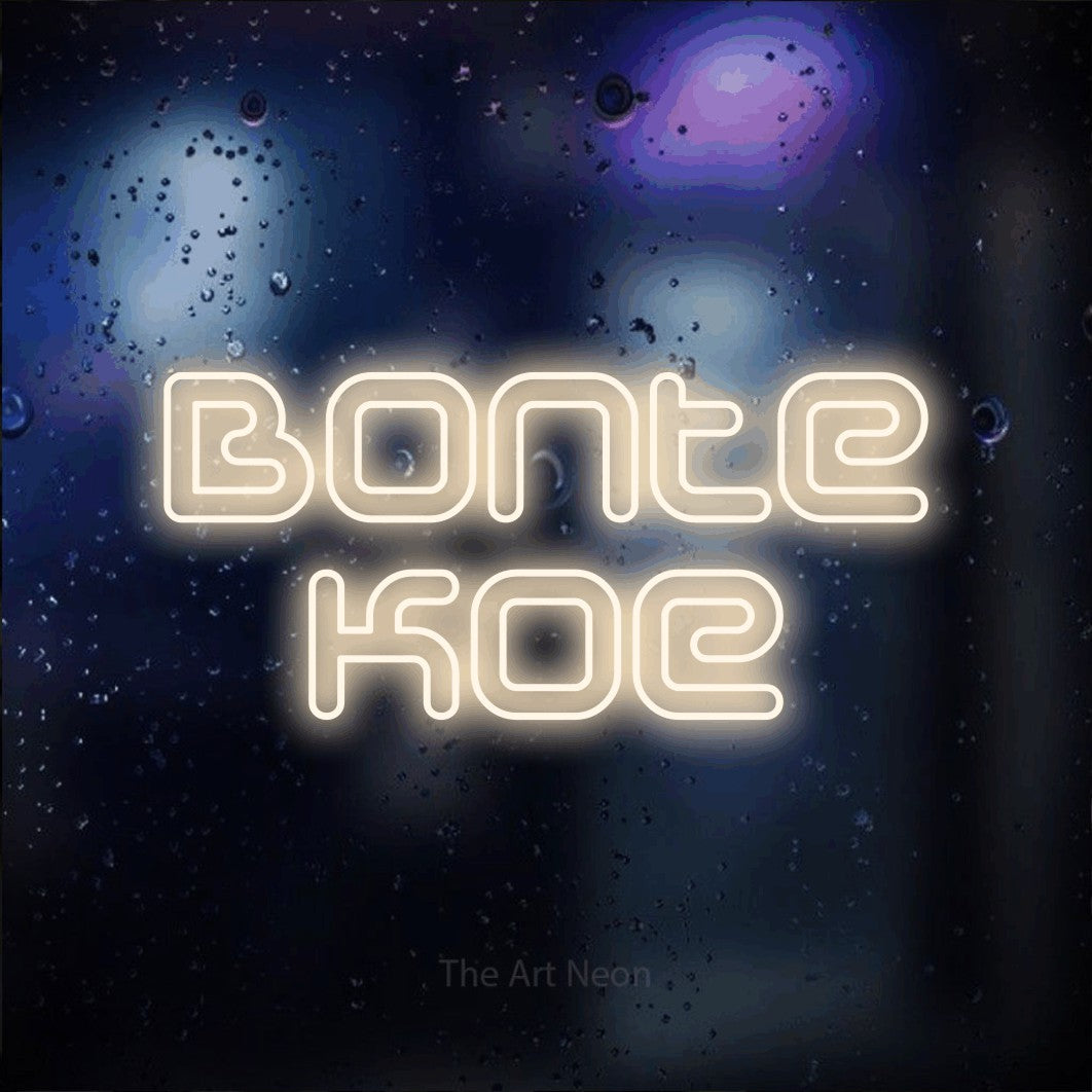 LED neon sign reading “Bonte Koe”, arranged in 2 lines.