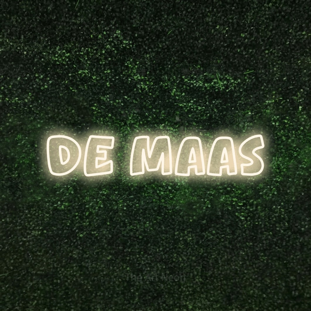 LED neon sign reading “De Maas”, arranged in a single line.