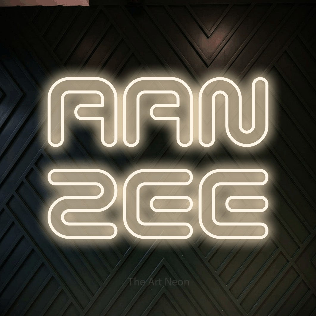 LED neon sign reading “AAN ZEE”, arranged in 2 lines.