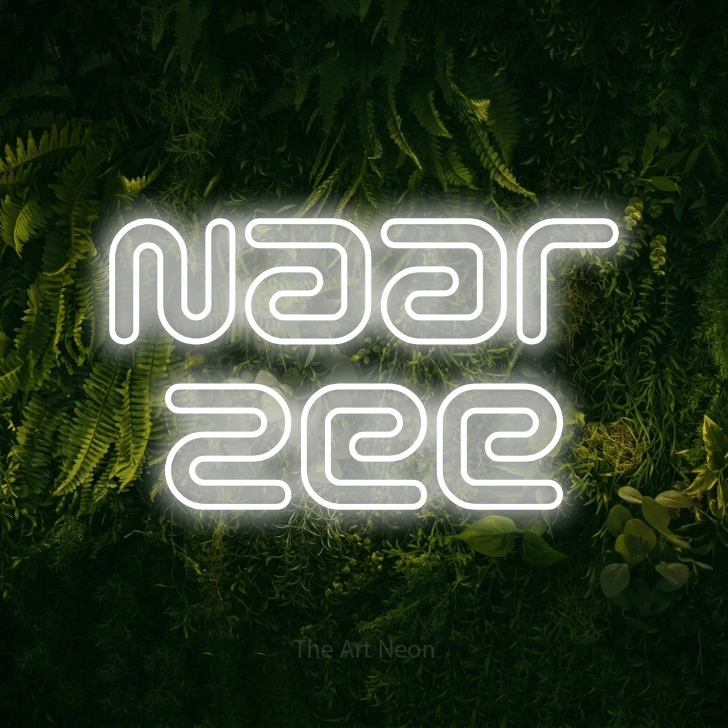 LED neon sign reading “Naar Zee”, arranged in 2 lines.
