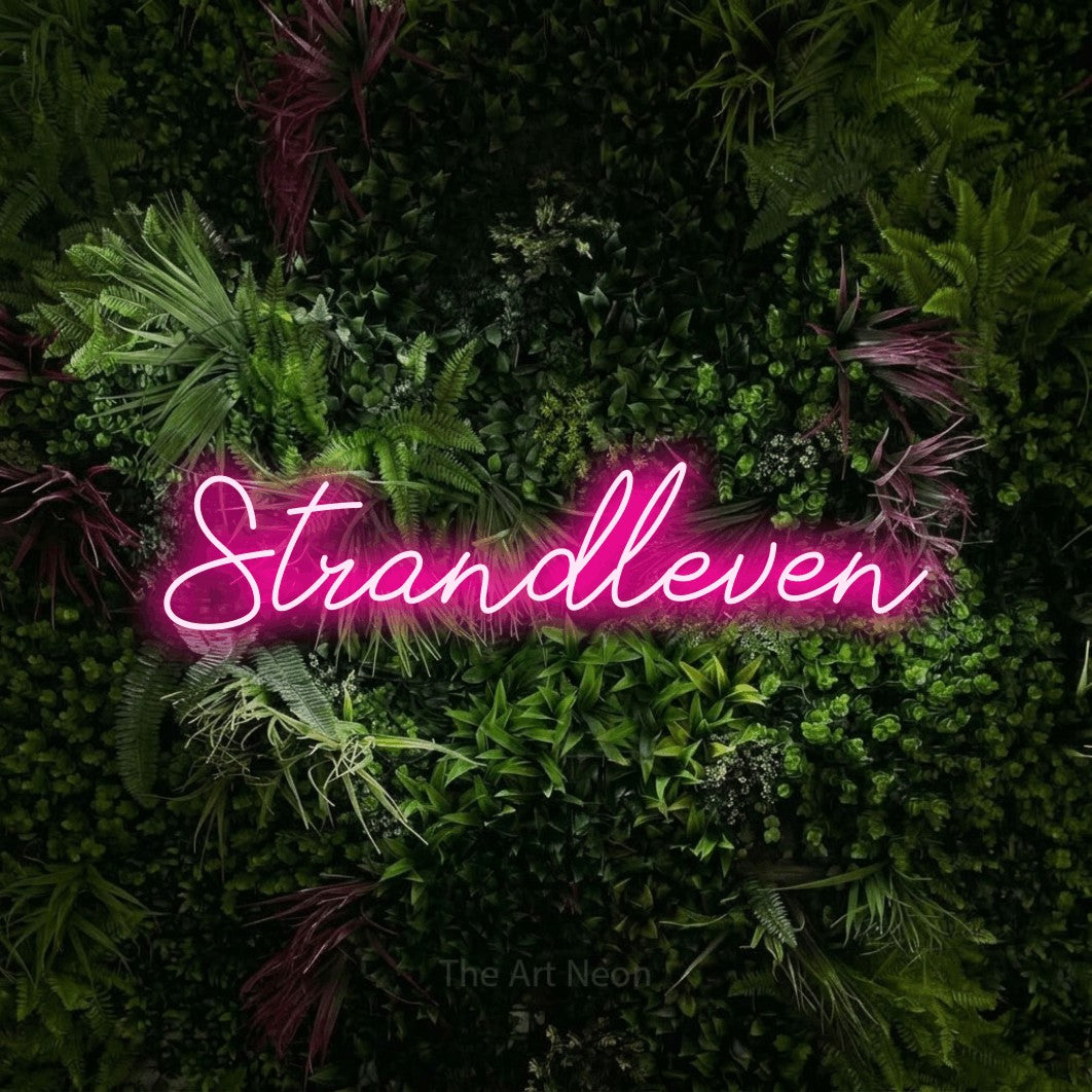 LED neon sign reading “Strandleven”, arranged in a single line.