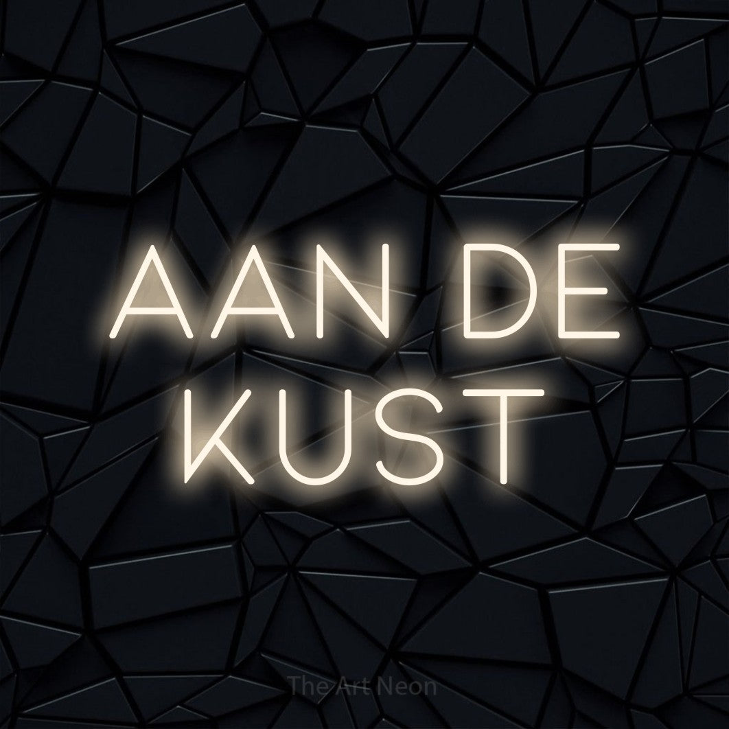 LED neon sign reading “Aan De Kust”, arranged in 2 lines.