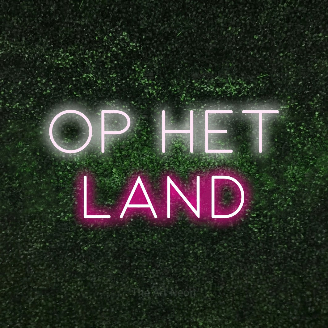 LED neon sign reading “op het land”, arranged in 2 lines.