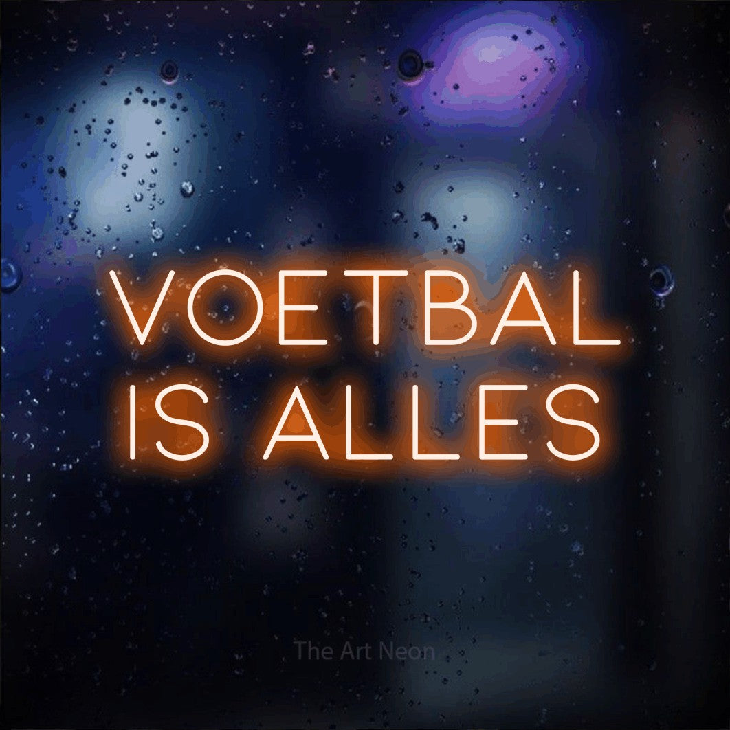 LED neon sign reading “Voetbal Is Alles”, arranged in 2 lines.