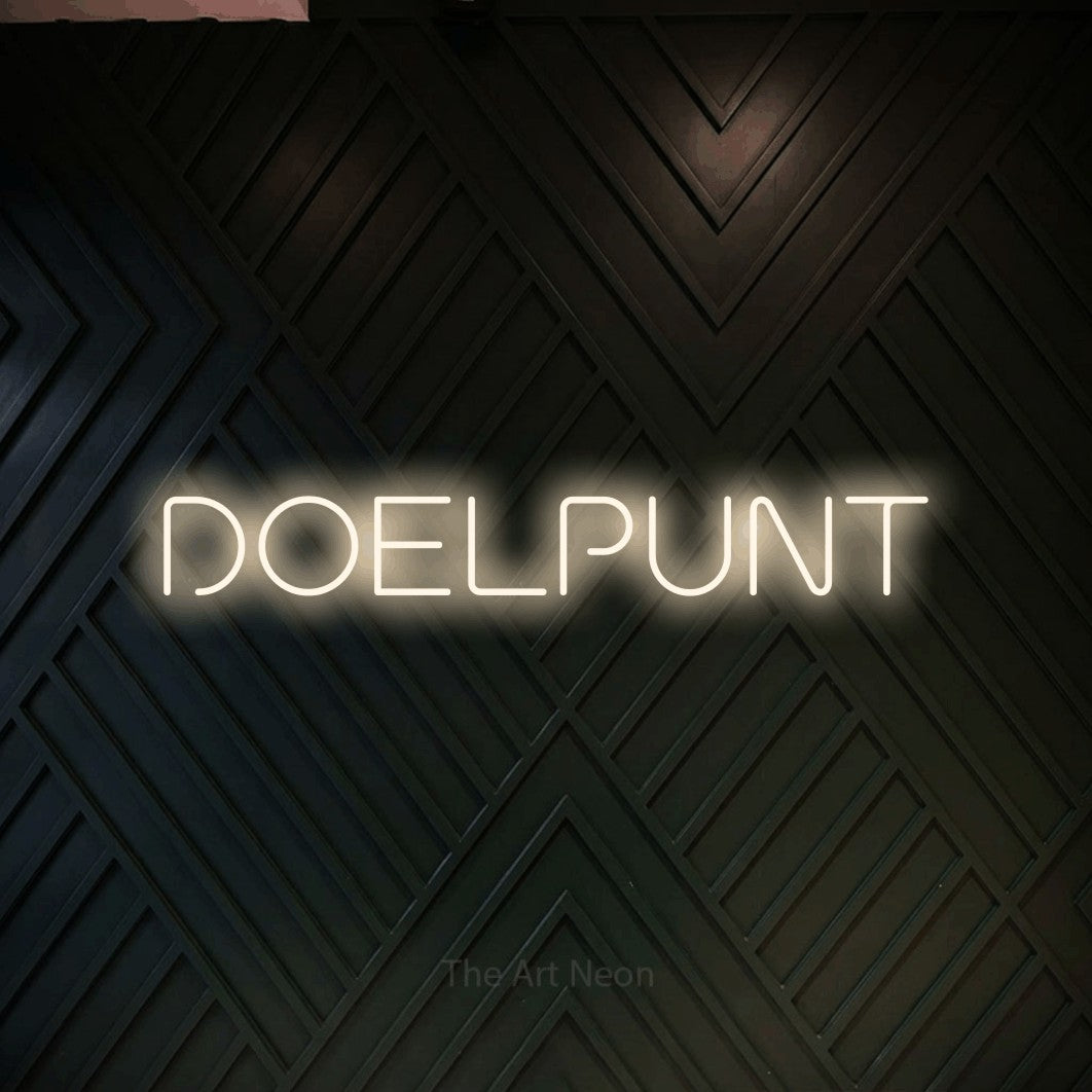 LED neon sign reading “DOELPUNT”, arranged in a single line.