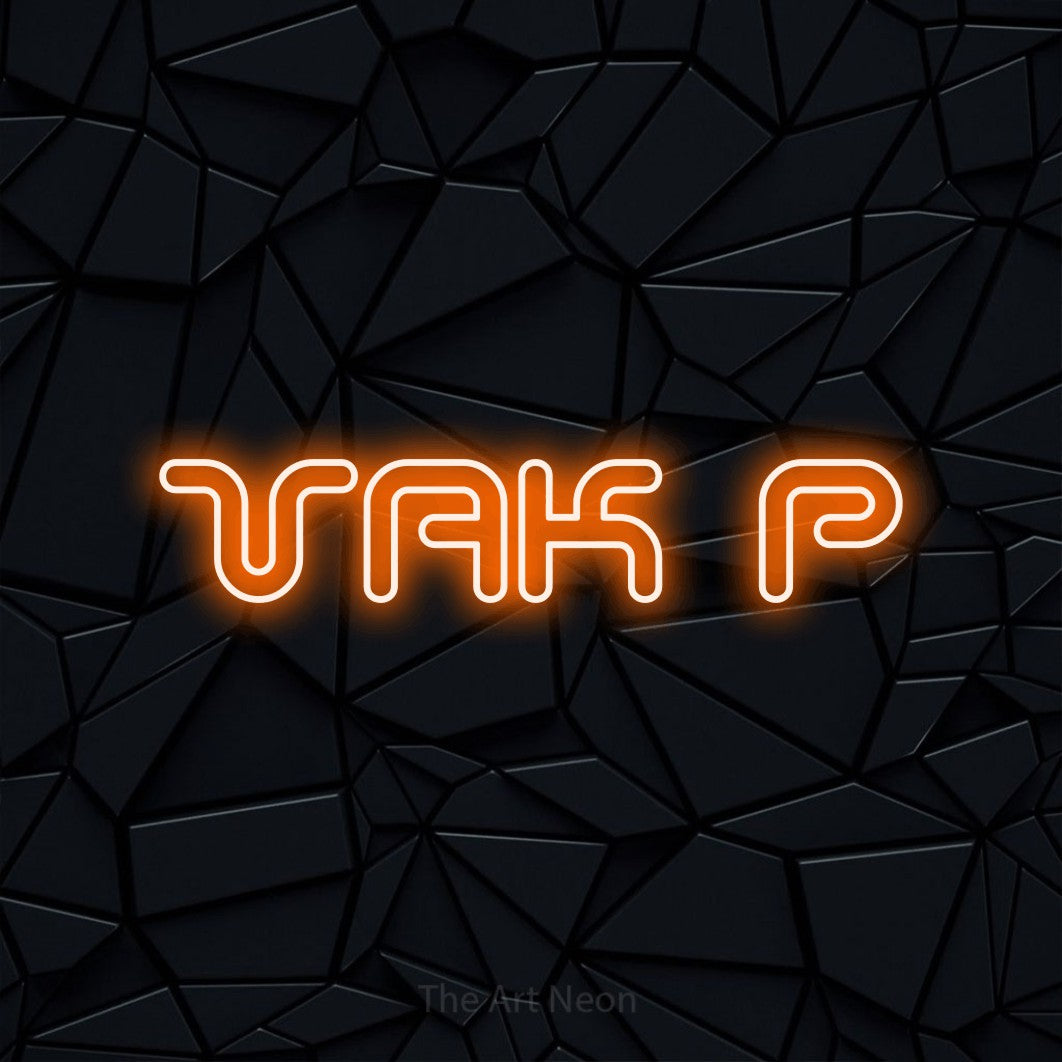 LED neon sign reading “VAK P”, arranged in a single line.
