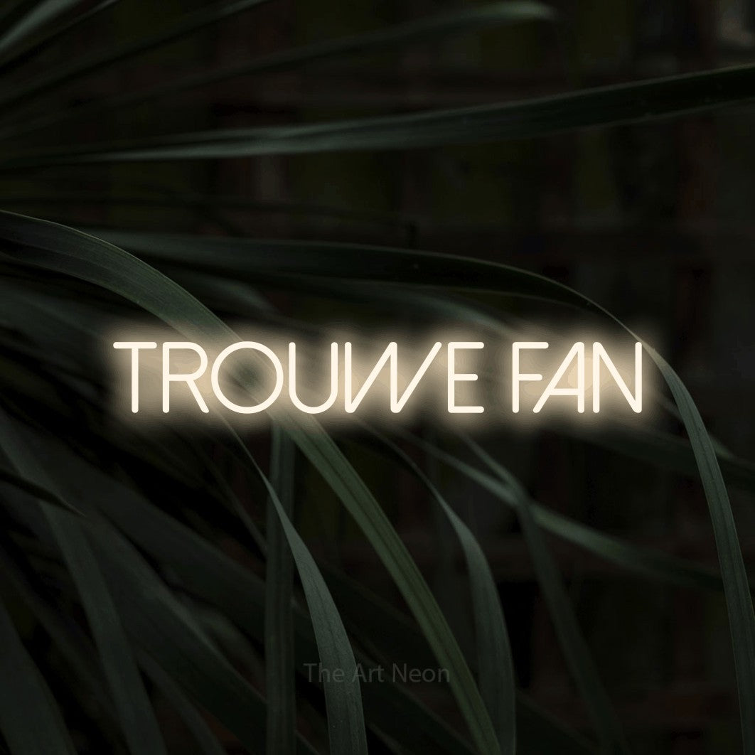 LED neon sign reading “TROUWE fan”, arranged in a single line.