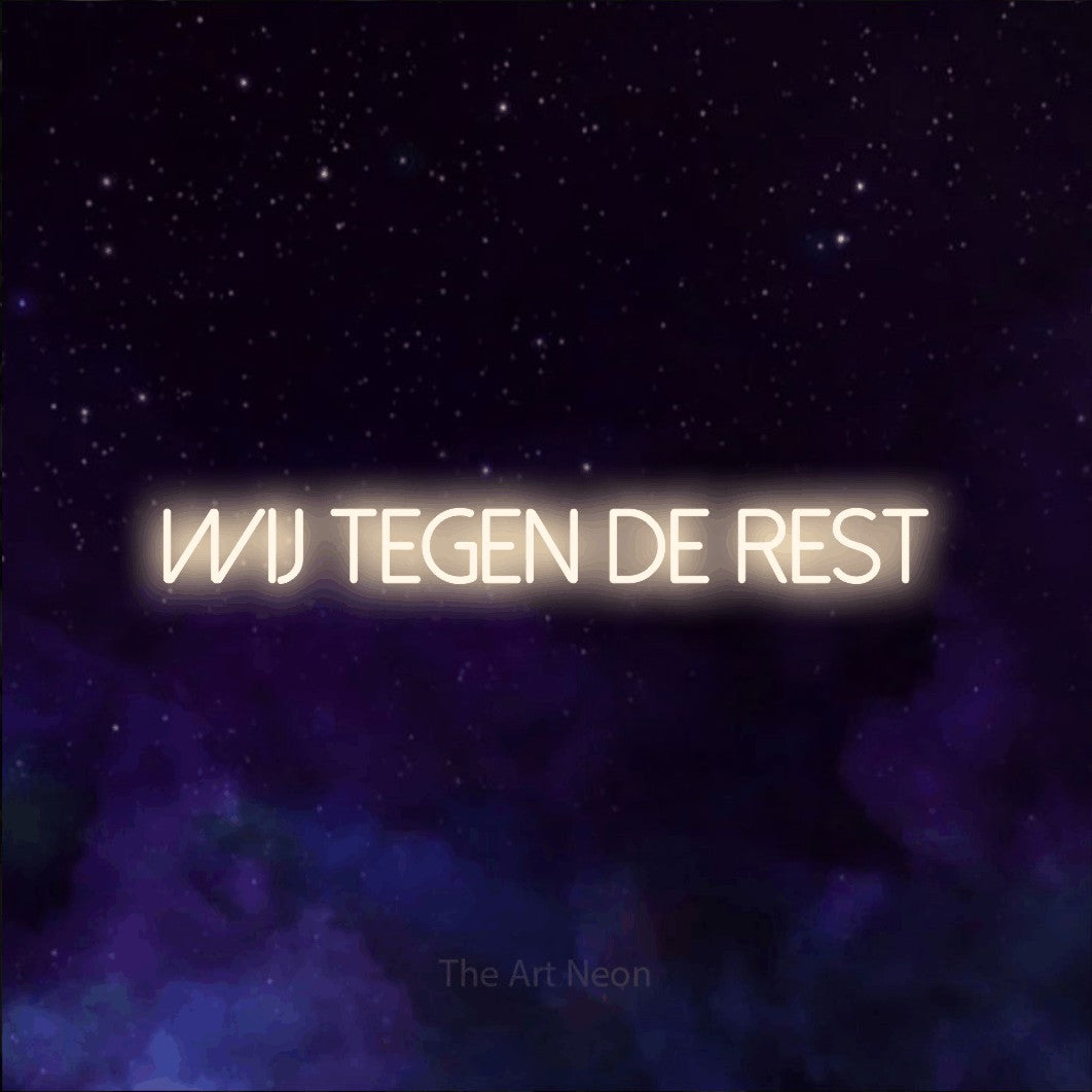 LED neon sign reading “Wij Tegen De Rest”, arranged in a single line.