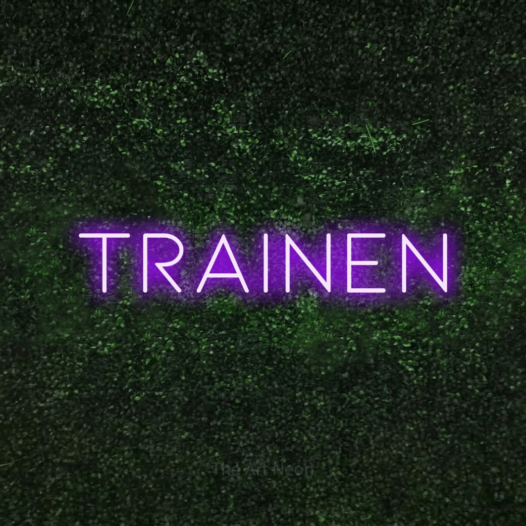 LED neon sign reading “TRAINEN”, arranged in a single line.