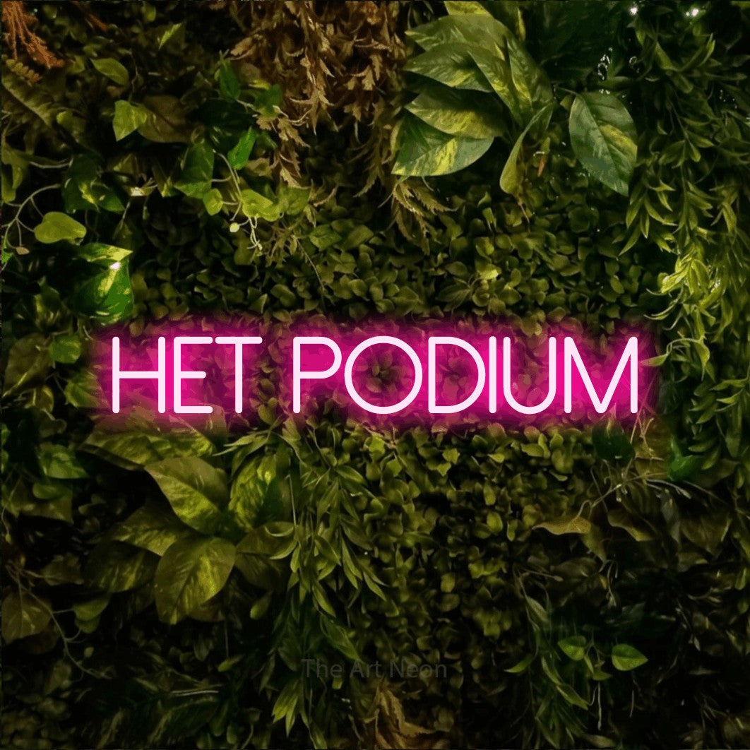 LED neon sign reading “het podium”, arranged in a single line.
