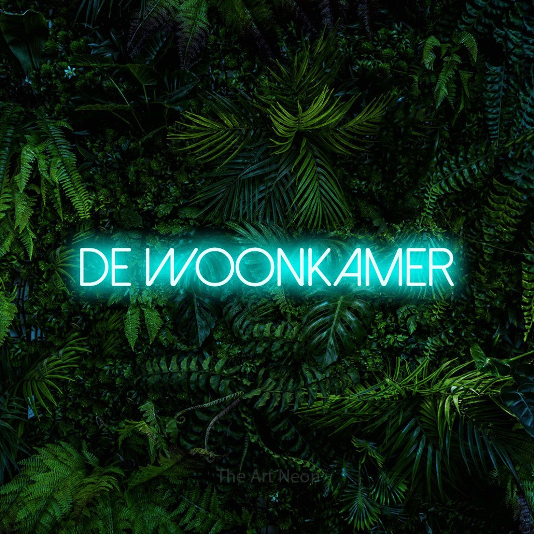 LED neon sign reading “DE WOONKAMER”, arranged in a single line.