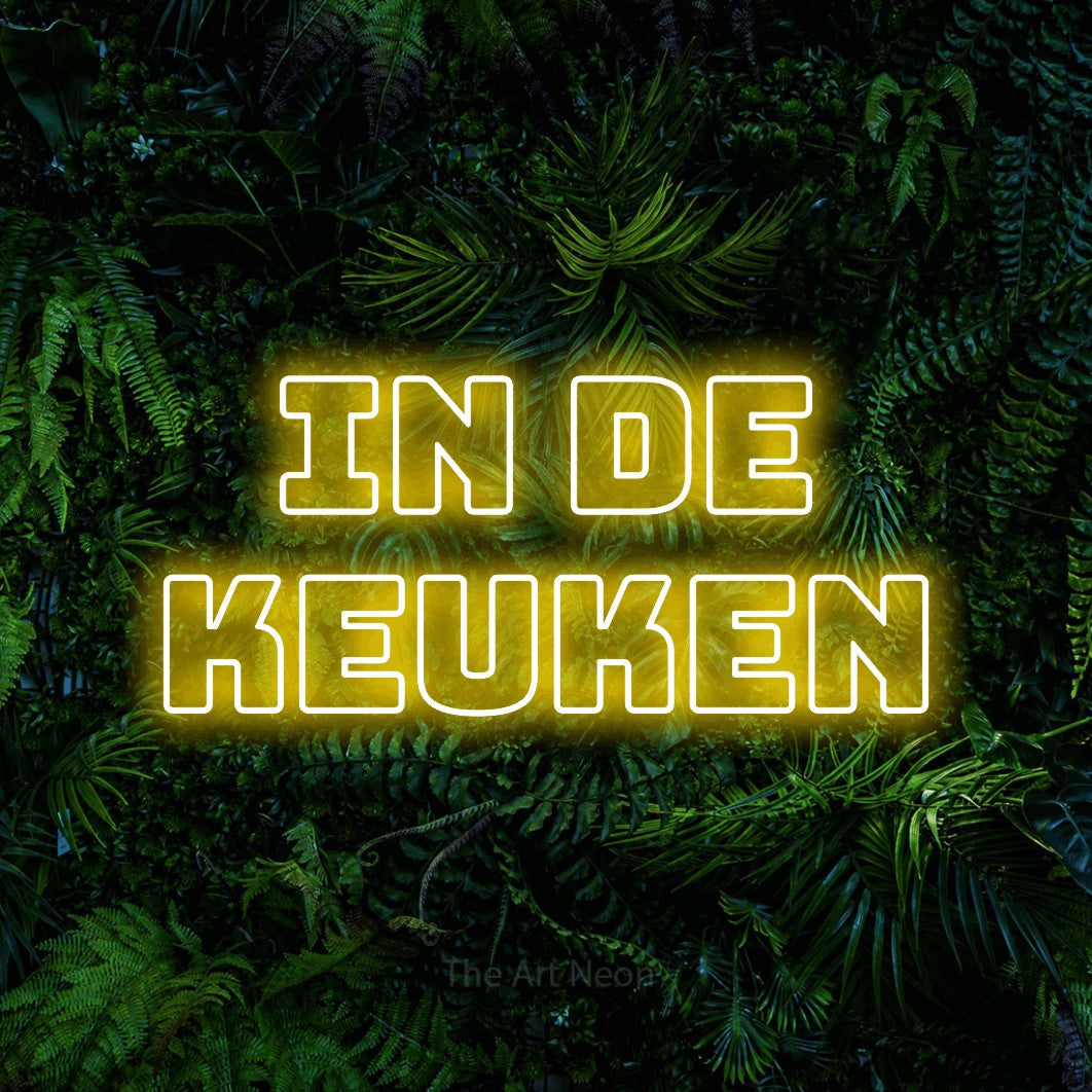 LED neon sign reading “In De Keuken”, arranged in 2 lines.