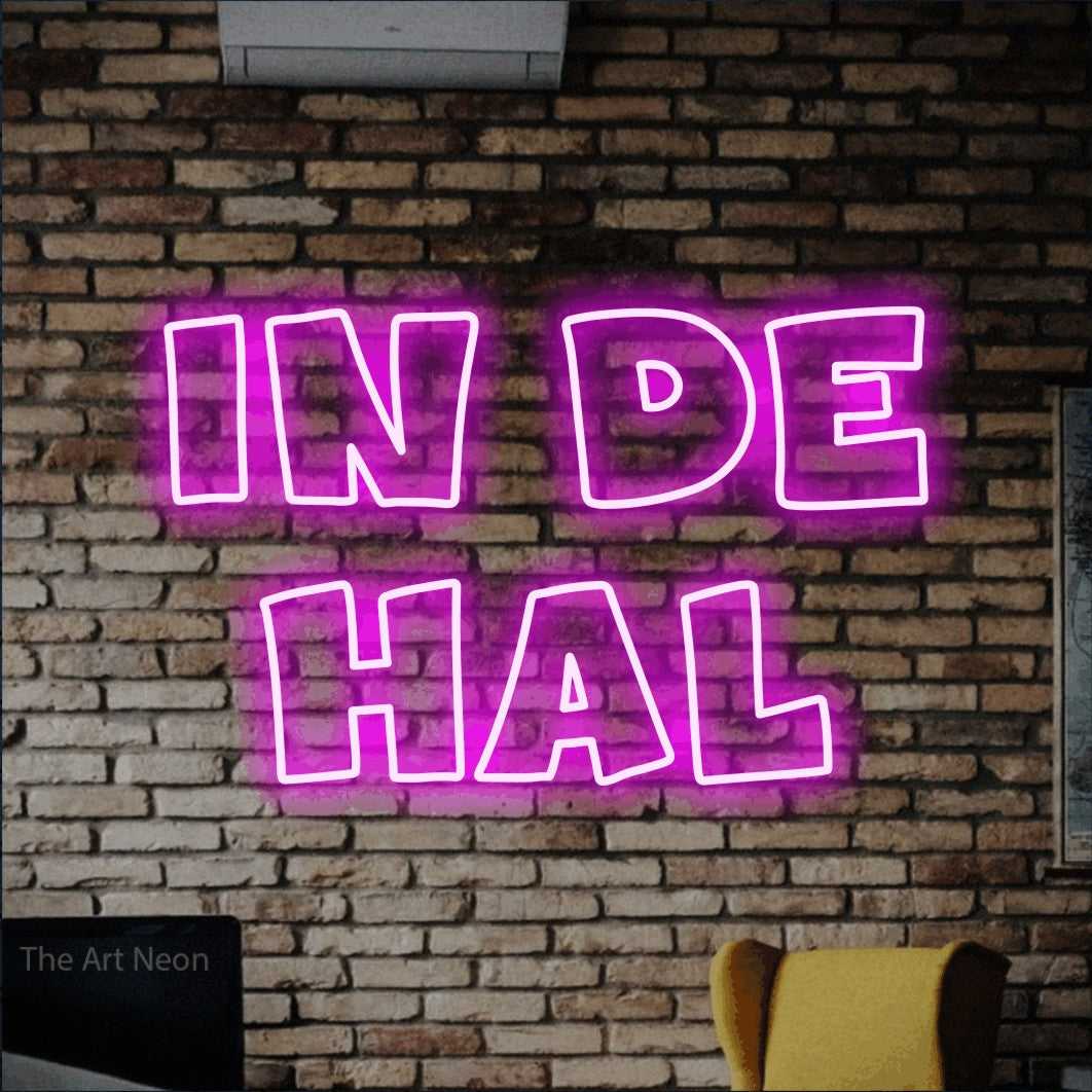 LED neon sign reading “IN DE HAL”, arranged in 2 lines.