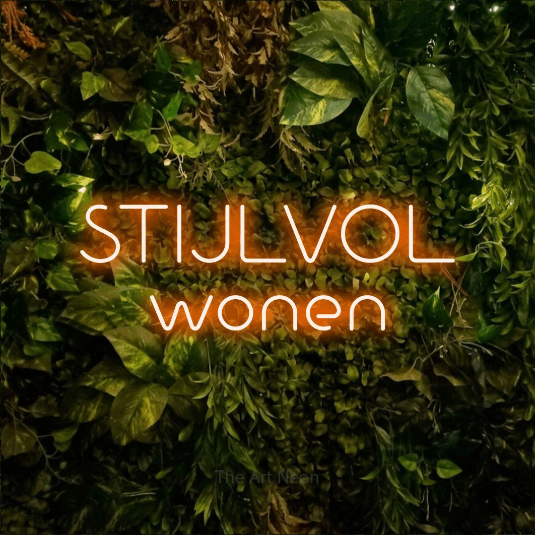 LED neon sign reading “STIJLVOL wonen”, arranged in 2 lines.