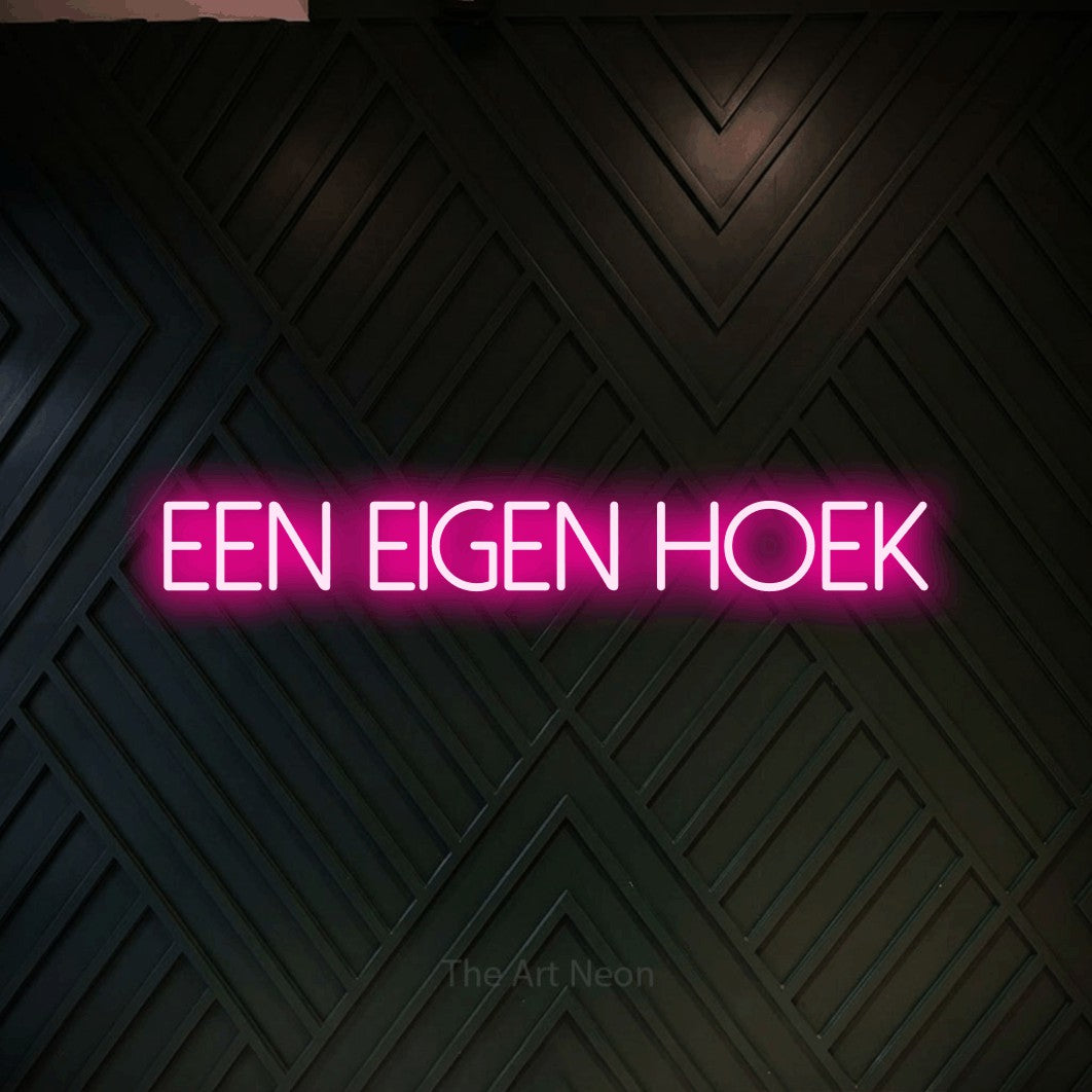 LED neon sign reading “een eigen hoek”, arranged in a single line.