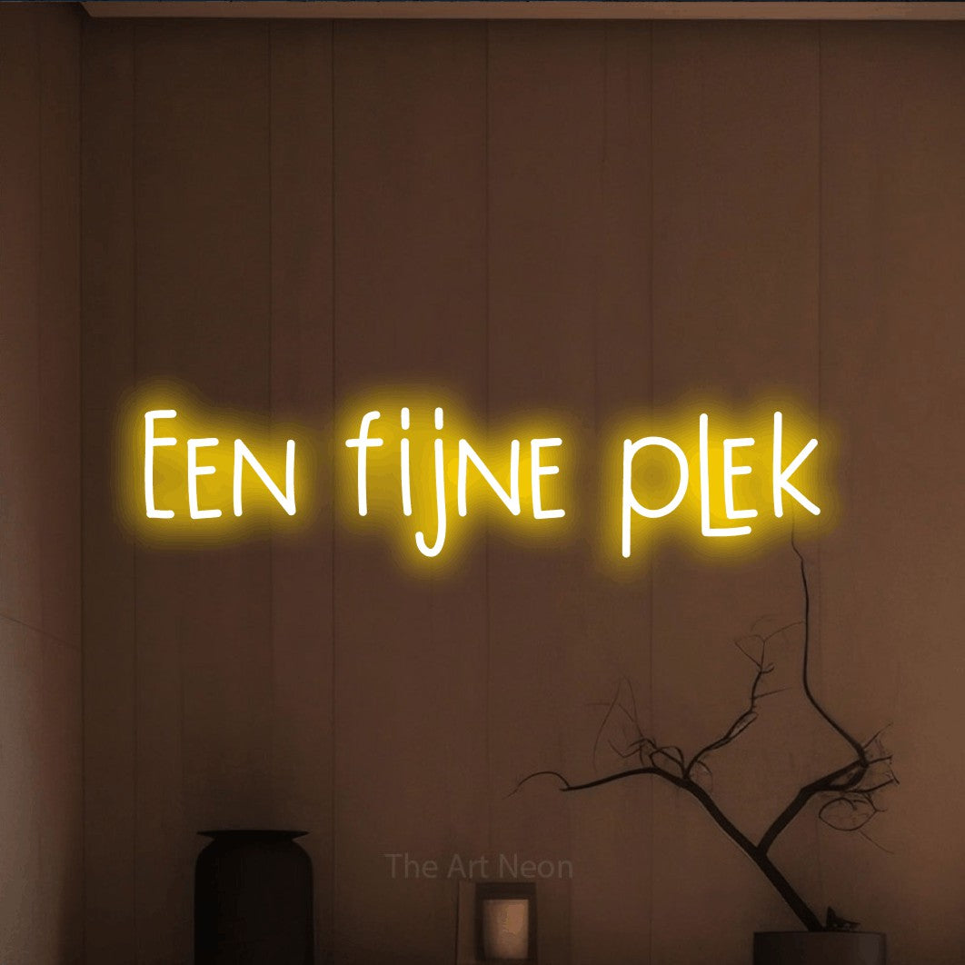 LED neon sign reading “Een fijne plek”, arranged in a single line.