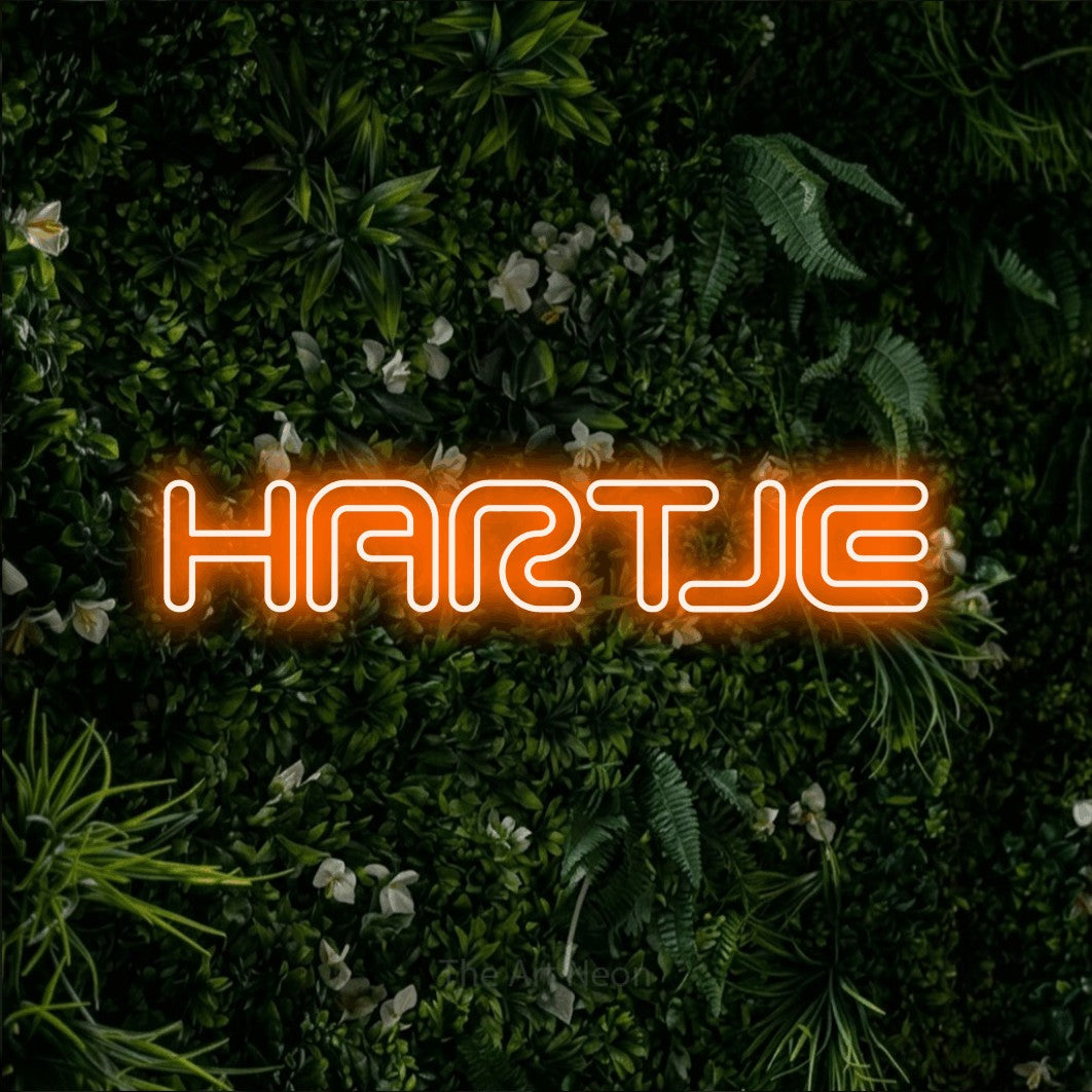 LED neon sign reading “HARTJE”, arranged in a single line.