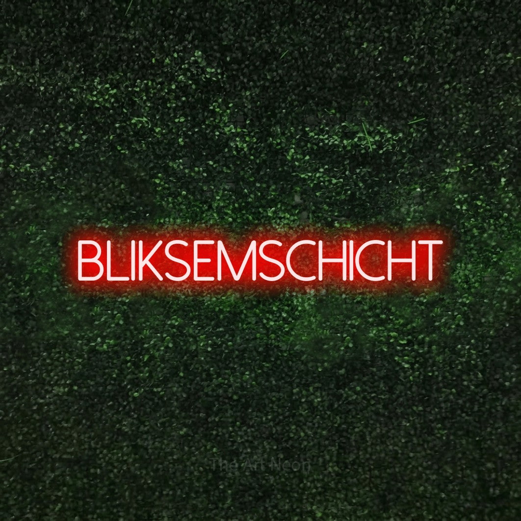 LED neon sign reading “BLIKSEMSCHICHT”, arranged in a single line.