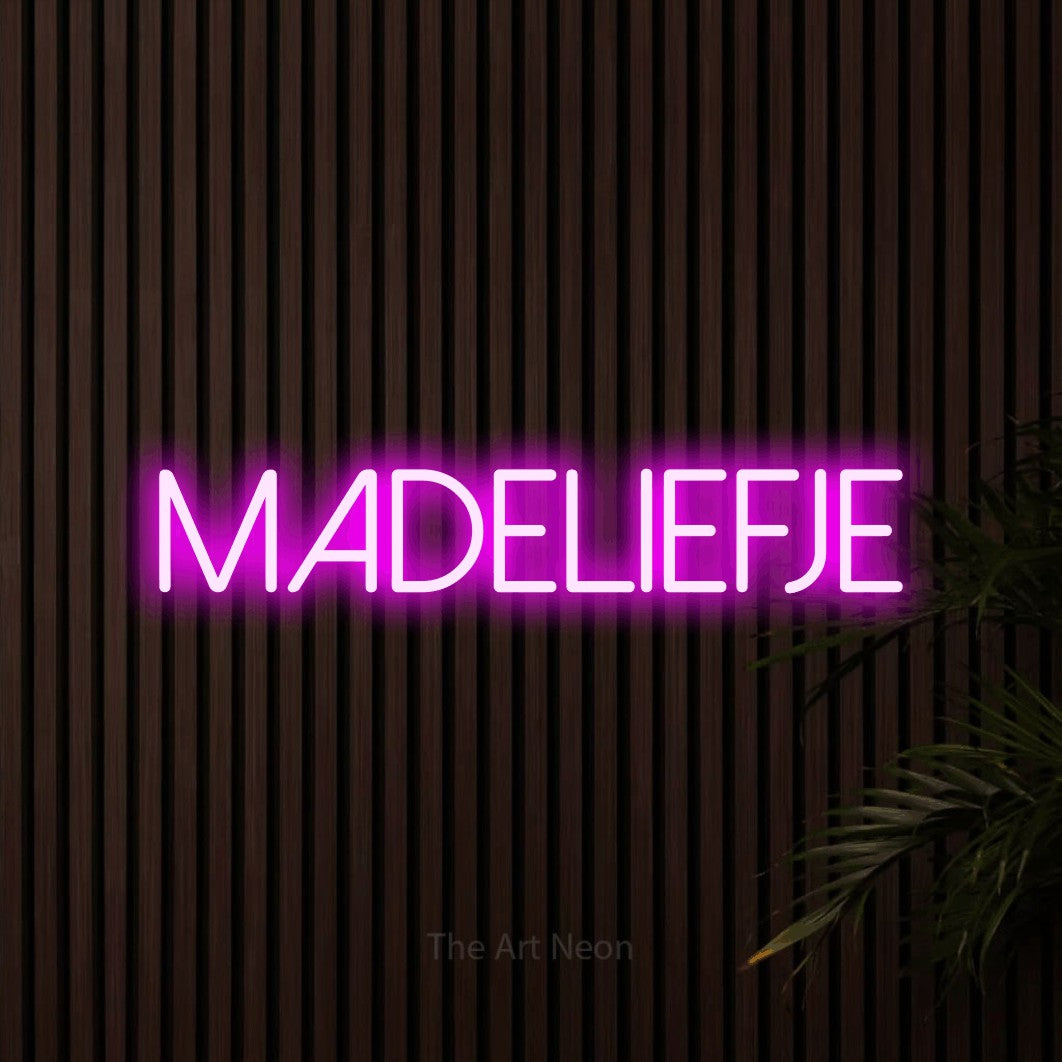 LED neon sign reading “madeliefje”, arranged in a single line.