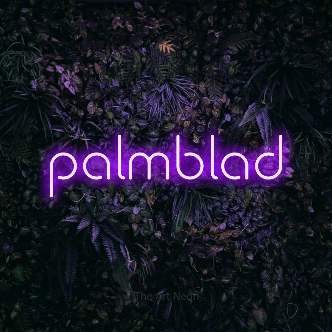 LED neon sign reading “palmblad”, arranged in a single line.