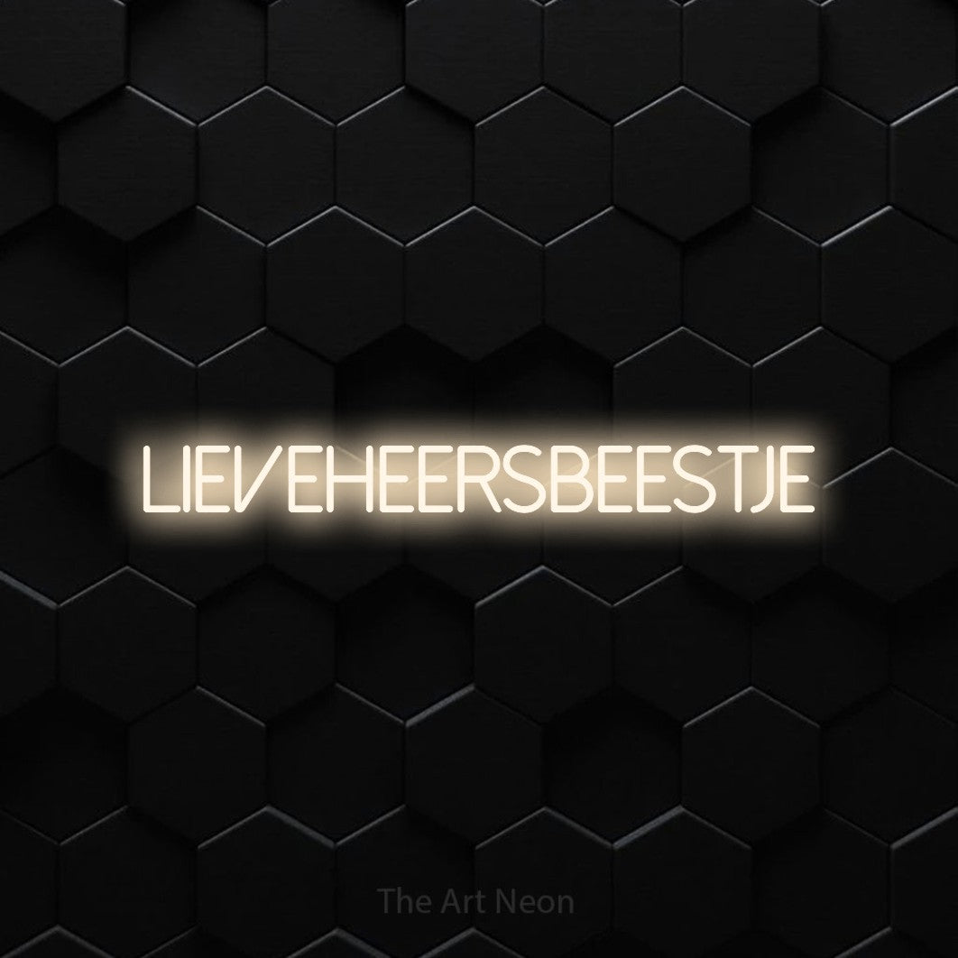LED neon sign reading “lieveheersbeestje”, arranged in a single line.