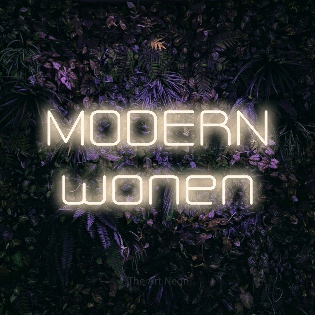 LED neon sign reading “MODERN wonen”, arranged in 2 lines.