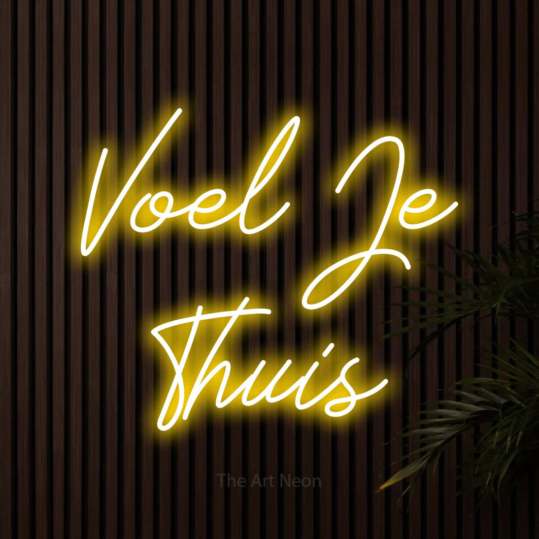LED neon sign reading “Voel Je Thuis”, arranged in 2 lines.